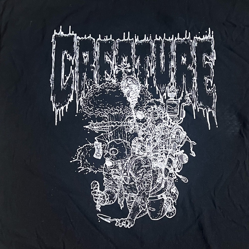 Brand new, never been worn, Black, extra large Creature teeshirt.